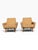 OVERVIEW A matched pair of mid-century Danish modern lounge chairs with a strong geometric silhouette. The deep seats and...