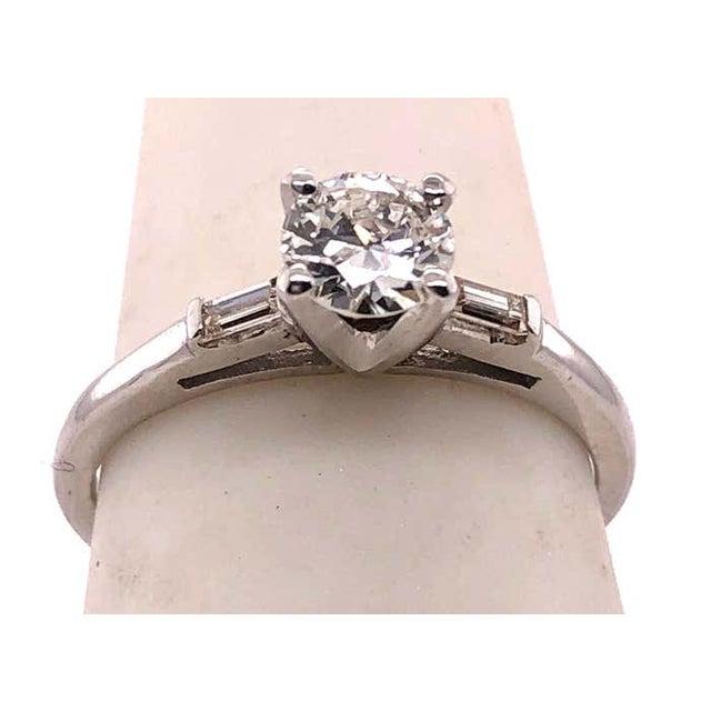 14Kt White Gold Engagement Ring 0.75 Total Diamond Weight. Size 7 with 2.19 grams total weight.