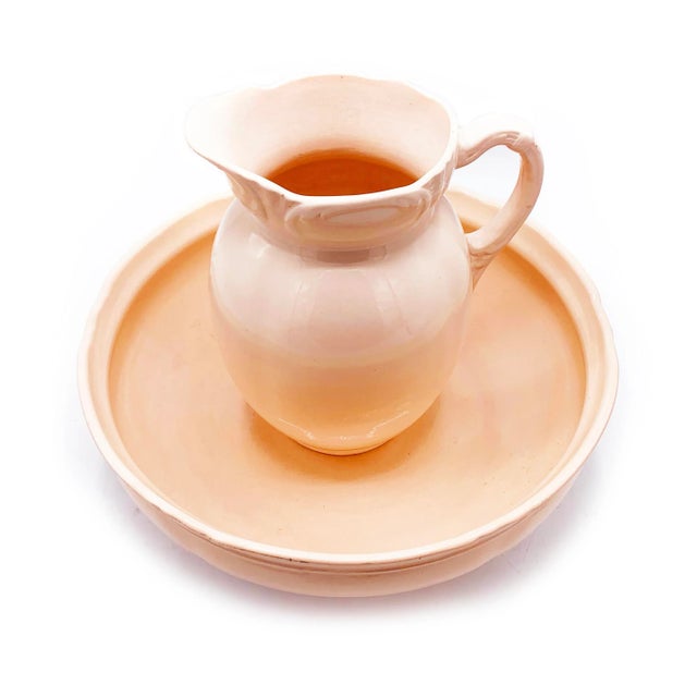 Large art deco French pink ceramic boudoir set. This set includes an oversized pitcher and its matching oversized wash...