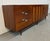 This listing is for a Mid-Century Modern American of Martinsville Accord Walnut Triple Dresser. Featuring a straight line...