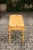 Mid-Century Modern Vintage English Midcentury Goldenrod Painted Wooden Bench with Black Accents For Sale - Image 3 of 11