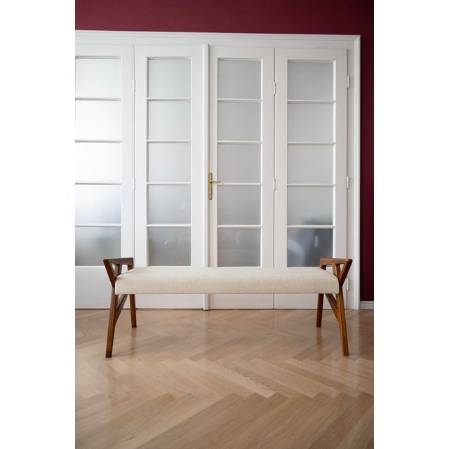 The bench's distinctive feature is its geometrically shaped sides, which give it a unique character and recall Ponti's...