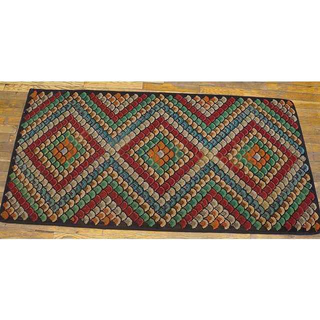 Antique American hooked rug. Size: 2'8"x 5'4". Antique American American Hooked Rug Multicolor 1930s, Circa Date: 1930s....