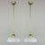 These elegant pendants were designed and manufactured in Sweden in the 1940s. The lights feature white opaline glass...
