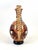 The decoration on the amphora shows traditional Sardinian motifs. The figure of a woman in traditional dress, as well as...