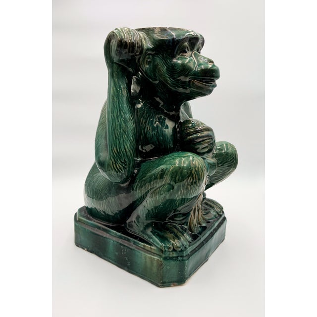 A vintage ceramic monkey garden sculpture. Excellent vintage condition.