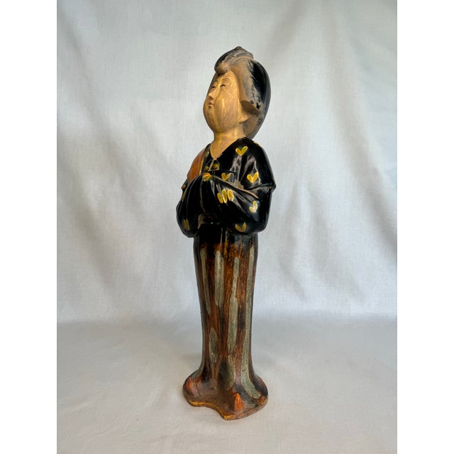 The height and details of this Asian Tang Dynasty style female figurine commands attention. Her feminine form and dress of...