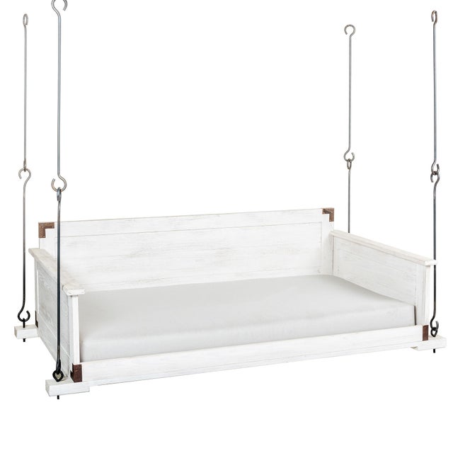 The Slatted Hanging Day Bed is an authentic and sturdy style for any look. The day bed can be found in both indoor and...