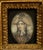 Elegant Indian miniature portrait painted on ivory, depicting a Mughal noblewoman in three-quarter profile. She wears an...