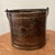 Crafted with an eye for both utility and aesthetic appeal, this Vintage Large Hammered Patinated Brass Kettle Bucket...