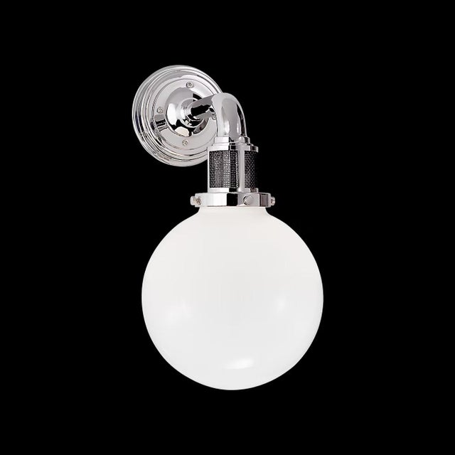 Two available. The McCarren by Ralph Lauren offers a modern, industrial interpretation of classic schoolhouse lighting....