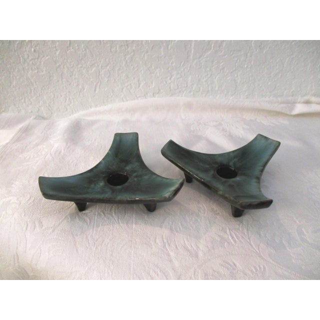 Mid-Century pair of Blue Mountain Pottery Canada candleholders in varying shades of dark and light green drip glaze. Each...