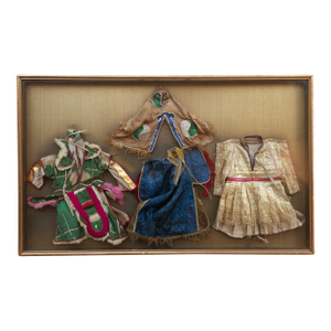 Framed Collection of Antique Children's Robes