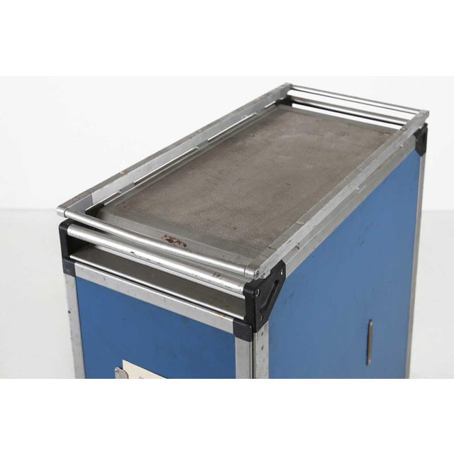 A striking relic of mid‑century aviation design, this industrial airline trolley embodies the precision and practicality...