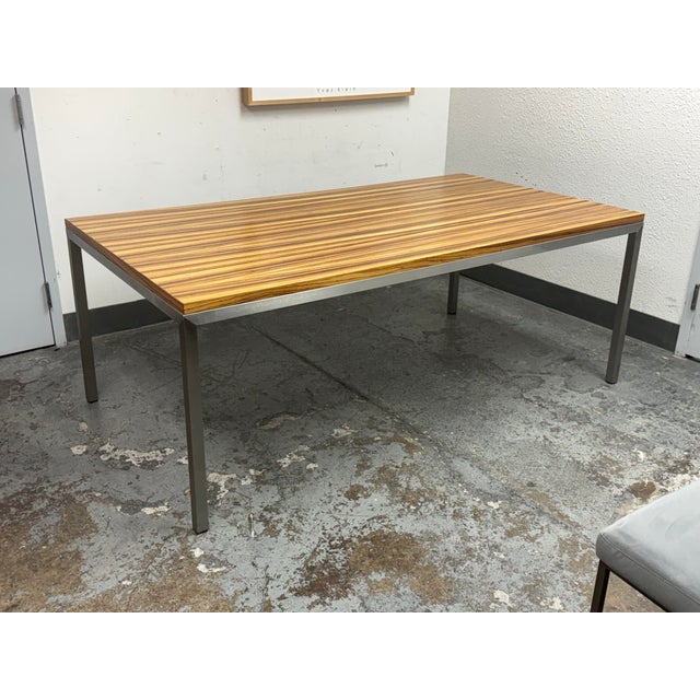 Design Plus Gallery presents a Room & Board Parsons Zebrawood Table. This Parsons-style table has a rectangular zebrawood...