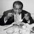 "Dinner Jazz" by Slim Aarons 1949: American Jazz trumpeter and singer Louis Armstrong (1898 - 1971) enjoys a plate of...