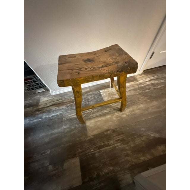 Antique Rustic Hand-Hewn Wood Saddle Stool, Mortise and Tenon Joinery. This unique primitive accent piece features a...