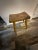 Antique Rustic Hand-Hewn Wood Saddle Stool, Mortise and Tenon Joinery. This unique primitive accent piece features a...