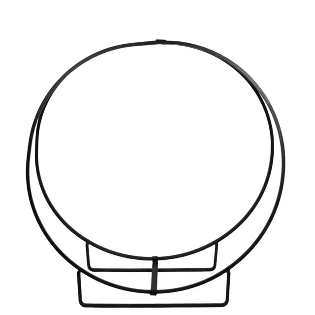 Large wrought iron fire place log holder, of circular form. This example is in excellent ready to use condition, it has...