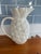 Fun ceramic pitcher in the shape of a pineapple. All white so perfect for that summer table. Designed after earlier...