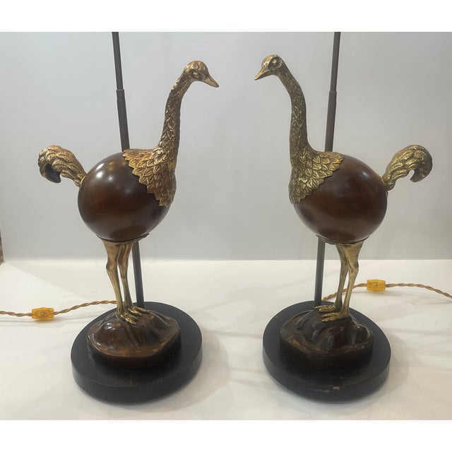 Just in this fabulous and Rare Pair of Vintage Ostrich Table Lamps, . The ostriches are facing each other . Made of Bronze...