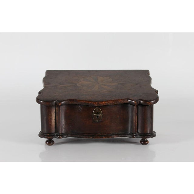 Antique Scandinavian Baroque style sewing box made from solid oak with a warm dark patina. Handcrafted by a skilled...