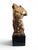 Elegant male torso sculpture in solid gilt bronze, created in Italy during the 1950s and mounted on a refined black marble...