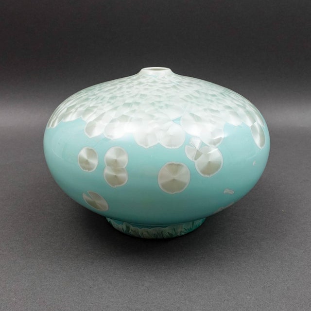 John Richard Powder Blue Mother Of Pearl Porcelain Vessel Vase. Measures approximately 8 1/2" diameter, 6" high.