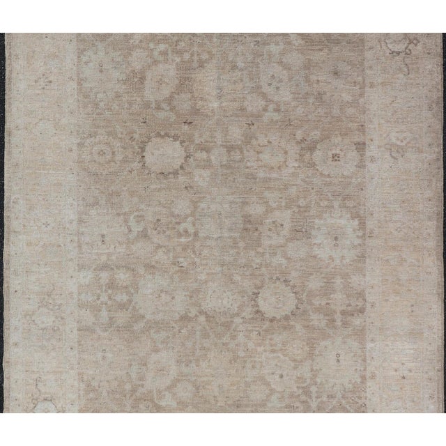 Measures: 5'3 x 7'10 Modern Tabriz Rug by Keivan Woven Arts in Warm Taupe and Soft Cream 5'3 x 7'10. Keivan Woven Arts /...