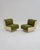 Iconic space-age lacquered wood armchairs with original green upholstery. Their spectacular shape and profile make them...