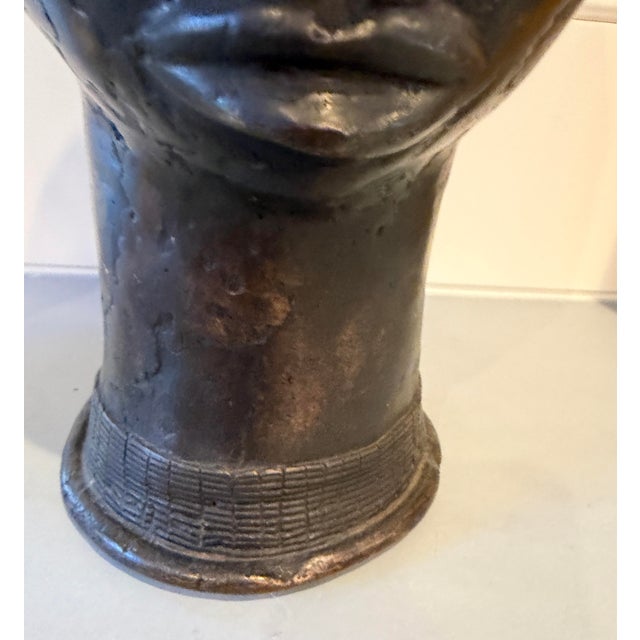 This elegant bronze sculpture made in the traditional lost-wax casting method was inspired by historical artistic castings...