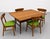 This vintage Mid Century Modern gem easily converts from a coffee table to a desk or console or to a full size dining...