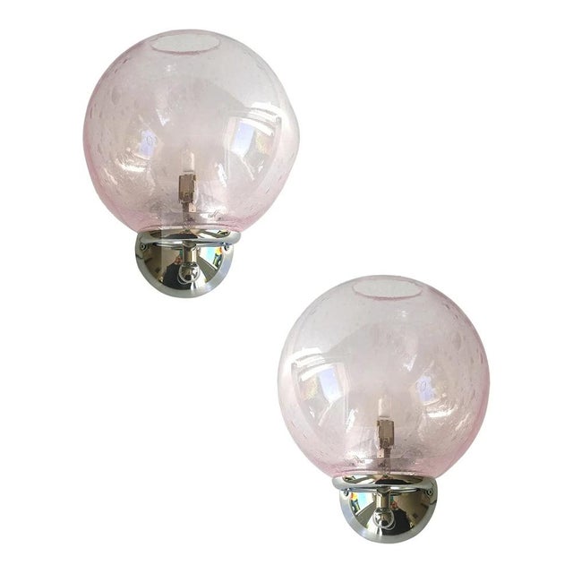 Luxury modern pink sphere in murano glass working with “pulegoso” a traditional tecnique of murano that give bubbles...