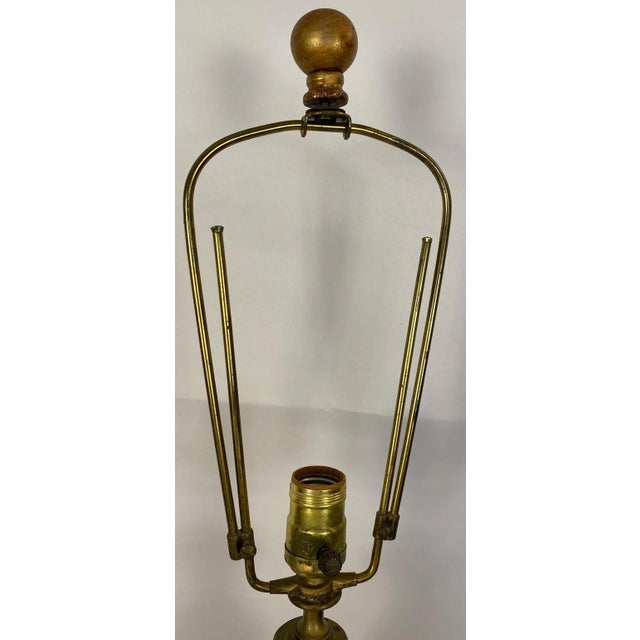 Pair of lamps in Japanese Imari porcelain style decorated with traditional figurative art, flowers and pagodas in pink and...