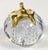 Vintage clear crystal glass paper weight in the shape of a pumpkin. Brass stem. Patina to brass. Free of chips or cracks...