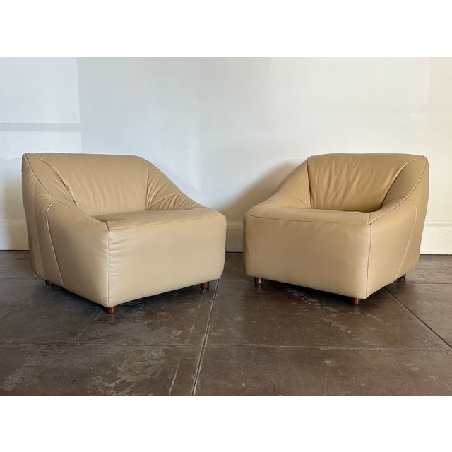 1980s soft leather chairs in great vintage condition. New upholstered leather. Unsigned. Dimensions 33” x 33” x 28” h Seat...
