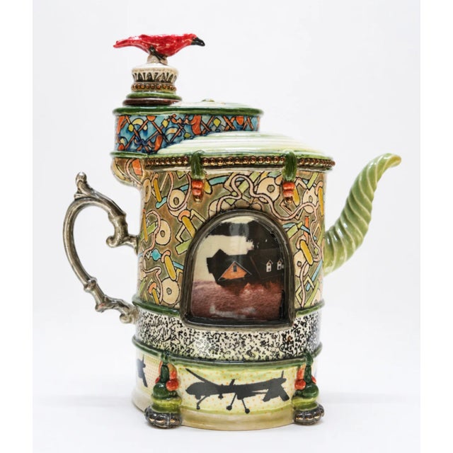 Teapot: Fire & Water explores the dynamic balance of opposing forces through an imaginative porcelain design that...