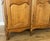 Vintage Louis XVI French Oak Four Door Carved Armoire For Sale - Image 6 of 11