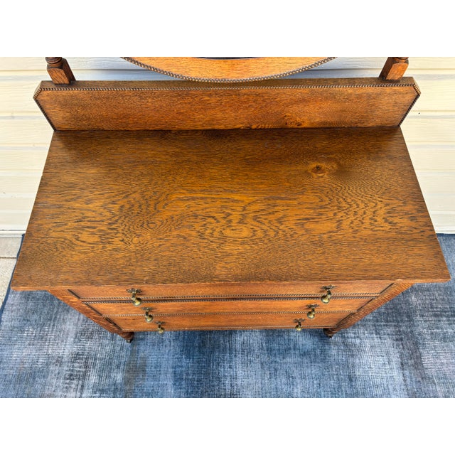 Antique oak barley twist vanity / 3-drawer dresser on casters with beveled swivel mirror. Excellent condition. Total...