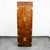 Campaign style armoire by Henredon from the Scene One collection. Dark walnut with brass hinges and latch pulls....