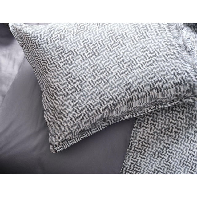 Our hazy blue-grey checkered houndstooth linen set is a handsome classic. Duvet (76" x 86") Standard Shams (20" x 26")...