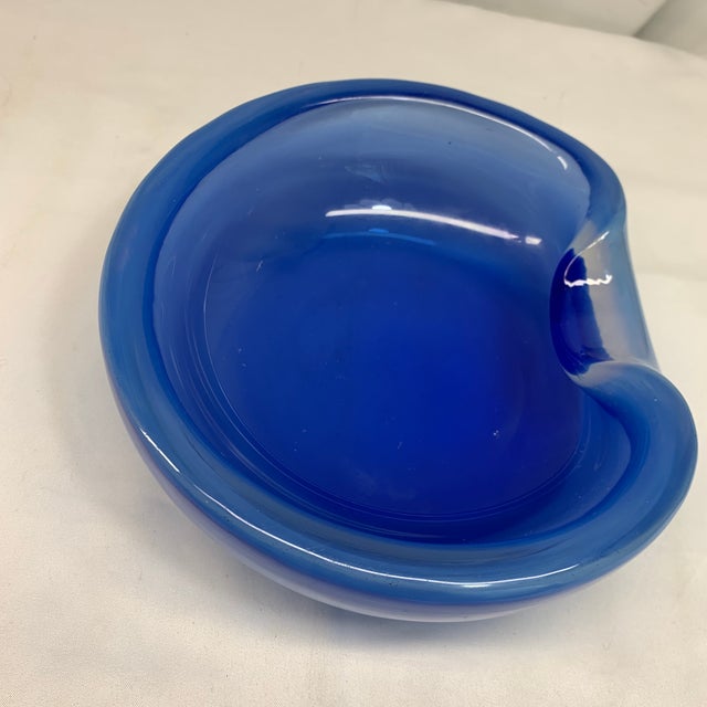 Add a striking pop of mid-century Venetian artistry to your space with this vintage biomorphic Murano art glass bowl....