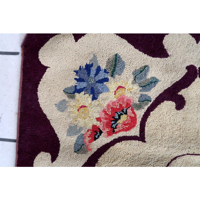 Handmade antique American Hooked rug in floral design. The rug is from the beginning of 20th century in good condition,...