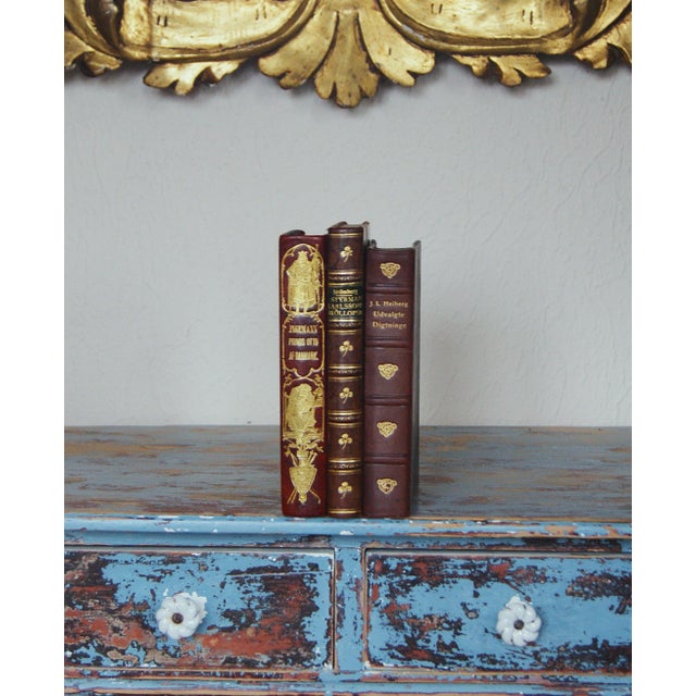 Set of 3 antique leather books in high quality books binding with gold ornament and marble papers - great as interior...