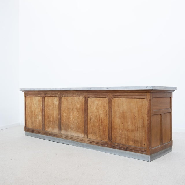 An impressive antique workshop cabinet offering ample storage and retaining its original patina. One side features a...