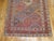 An early 20th century weathered textured appeal Persian Afshar rug with a colorful all-over diamond shaped design....