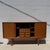 Danish modern teak sideboard by Omann Jun Møbelfabrik, circa 1960s. Crafted in warm, honey-toned teak, the piece...