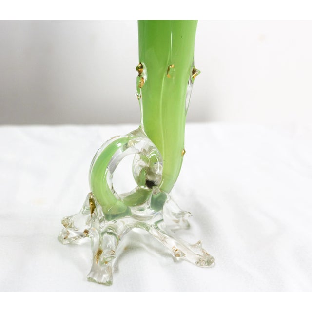 Soliflor vase imitating a rose stem, with a handle on the down side. Colored and gilded glass, French circa 1960. Good...