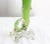 Soliflor vase imitating a rose stem, with a handle on the down side. Colored and gilded glass, French circa 1960. Good...