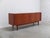 Very nice sideboard in the style of Arne Vodder produced in Denmark around 1960. This model features beautiful tambour...